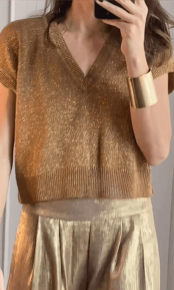 Stylish silver women's two-piece set featuring a modern pant design, ideal for summer fashion and comfort.
