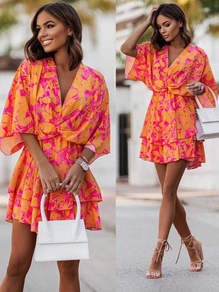 Chic mini dress for women, elegant v-neck & short length. Perfect for versatile summer fashion & casual wear.