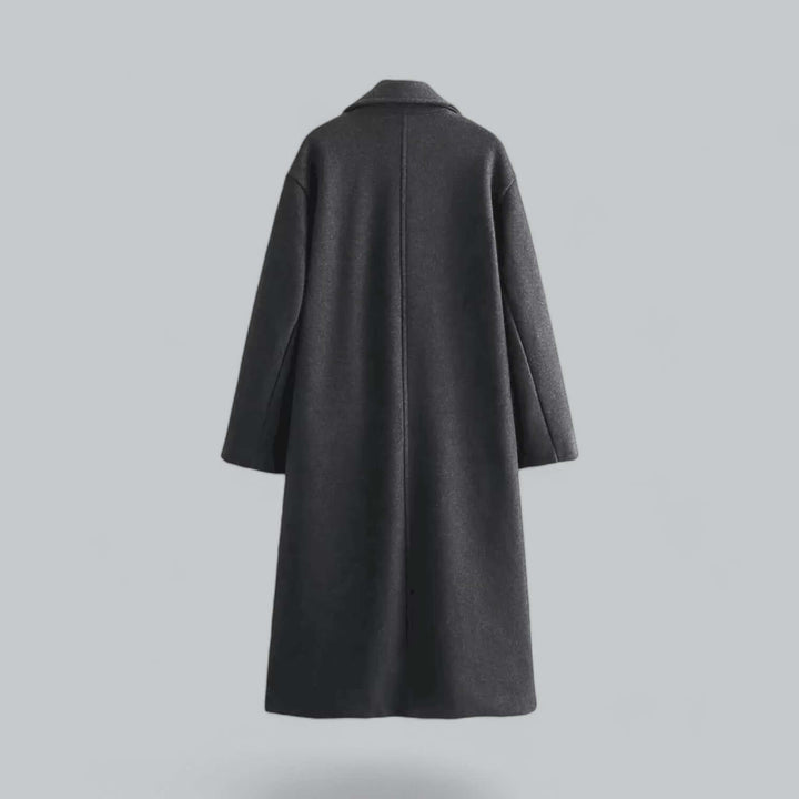Chic long buttoned women's coat for effortless style. Elegant oversized outerwear.