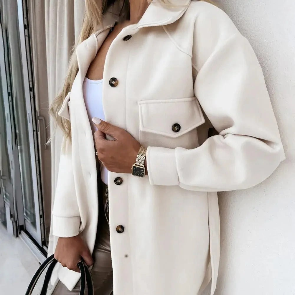 Elegant women's slim fit jacket, perfect for spring. Chic mid-season outerwear in a comfortable polyester blend.