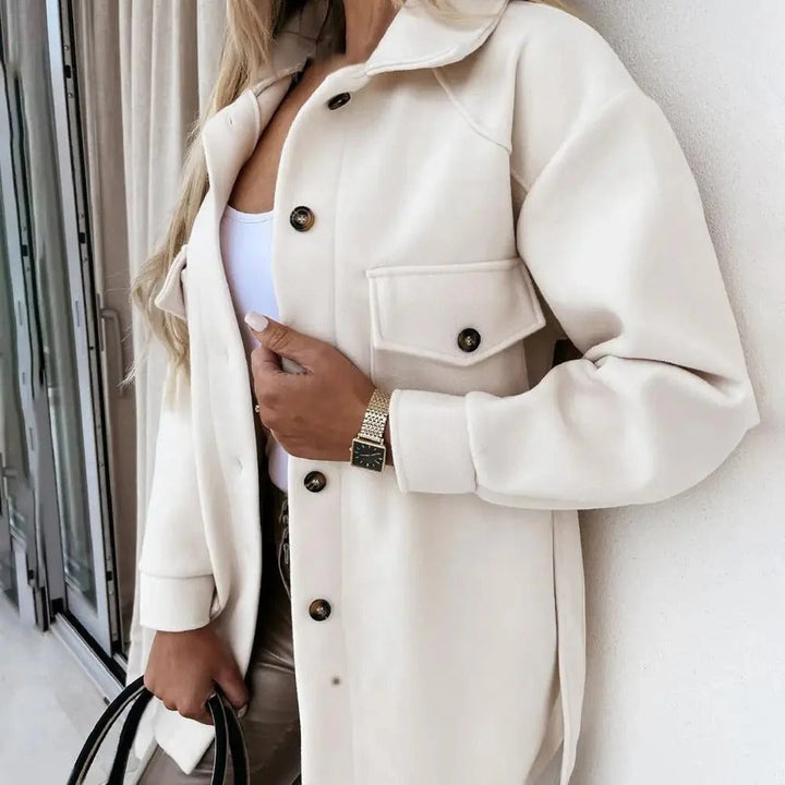 Elegant women's slim fit jacket, perfect for spring. Chic mid-season outerwear in a comfortable polyester blend.