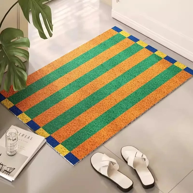 Chic striped entryway doormat, modern & durable PVC outdoor mat. An anti-slip welcome mat for your home.