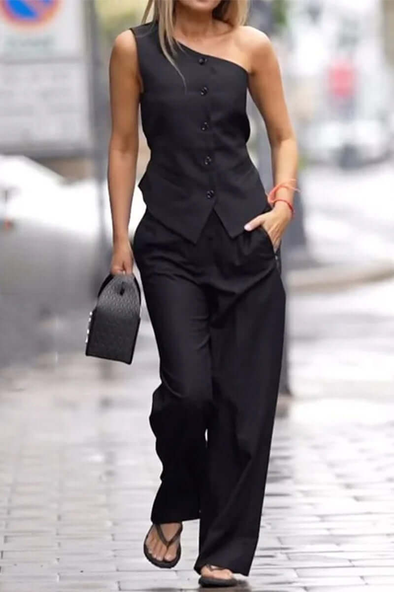 Chic women's black two-piece set: sleeveless asymmetric top & high-waisted tailored pants. Elegant coordinated outfit.