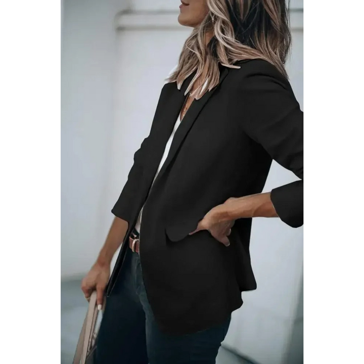 Elegant women's plain blazer with distinct puff sleeves, ideal for modern office wear or stylish outerwear.
