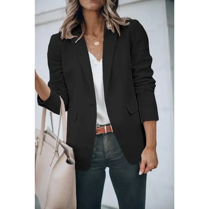 Stylish women's blazer "Mia" with elegant puff sleeves, designed for casual elegance and modern fashion.