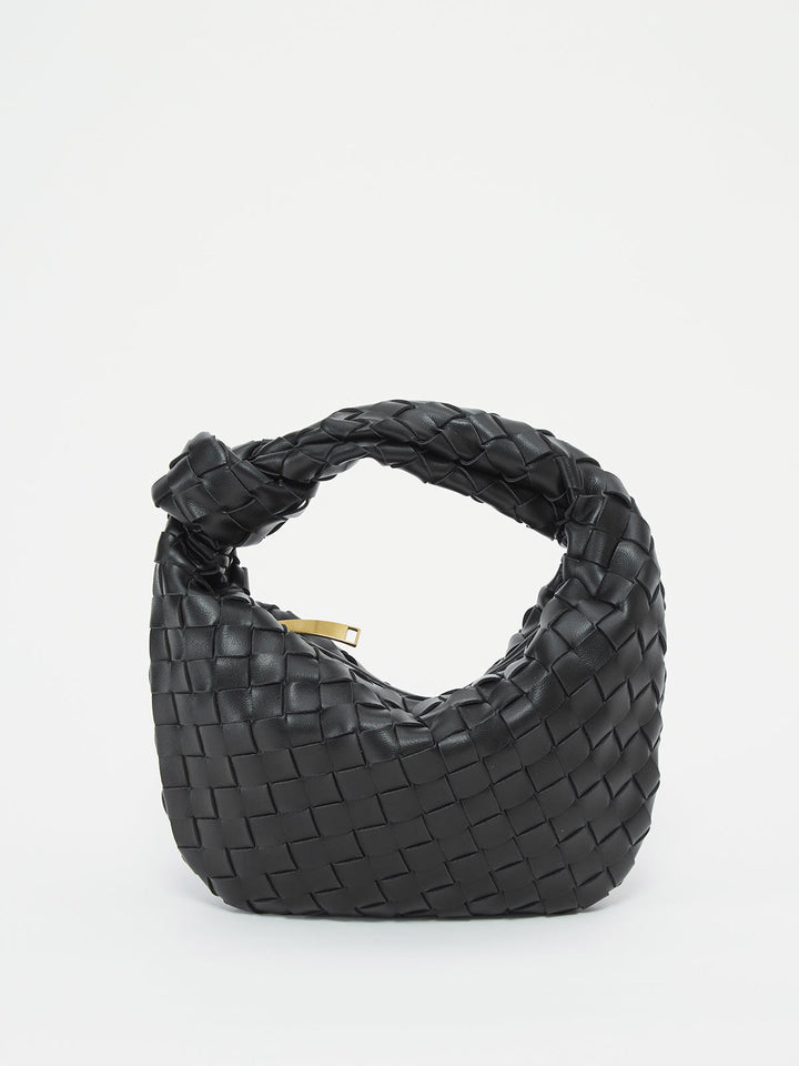 Chic women's braided knot handle shoulder bag, a stylish and textured fashion accessory.