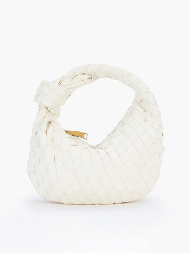 Unique women's shoulder bag featuring a braided knot handle, a textured and chic fashion handbag.