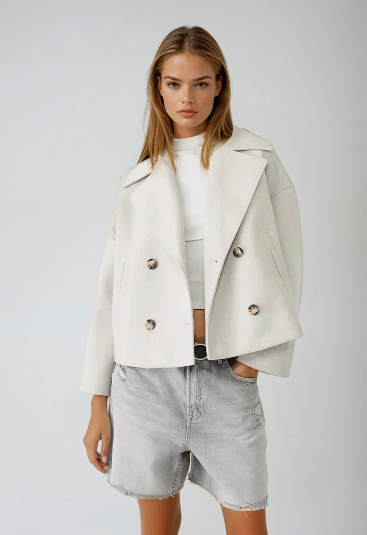 Chic women's cropped double-breasted jacket, perfect for modern fall & winter style. Tailored outerwear.