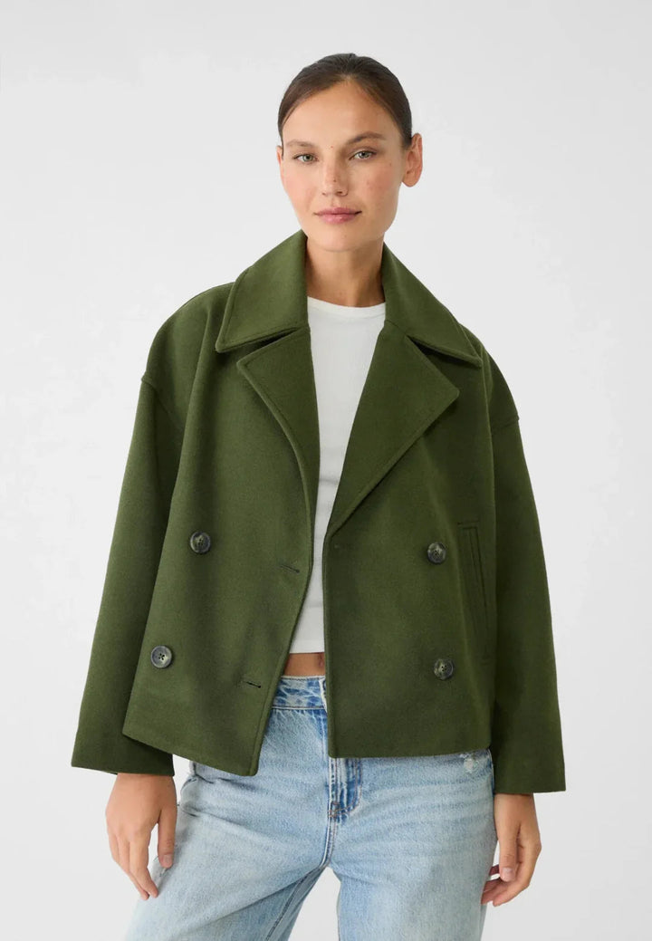 Elegant women's cropped jacket, tailored double-breasted design. Chic outerwear for fall & winter fashion.