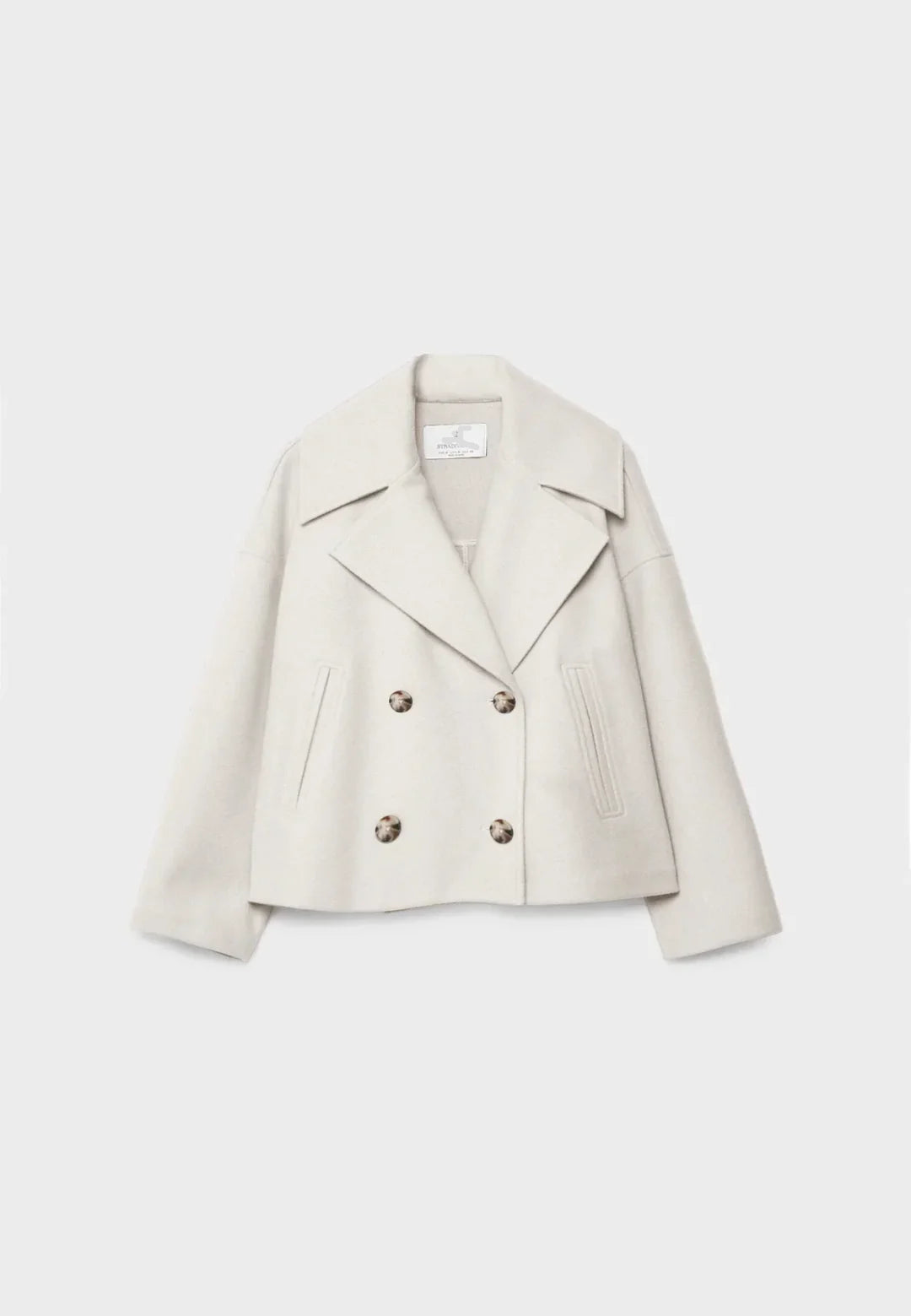 Fashionable women's short double-breasted jacket with a chic cropped cut. Modern outerwear for fall & winter.