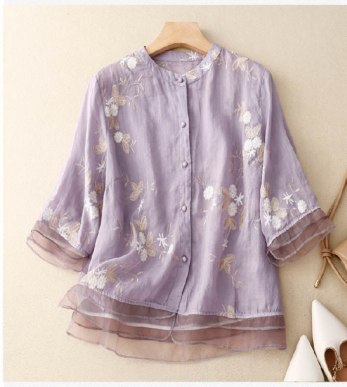 Stylish women's long-sleeve blouse with intricate embroidery, perfect for effortless fashion.