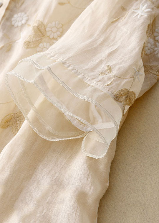 Chic embroidered long-sleeve blouse for women, an elegant and versatile fashion top.
