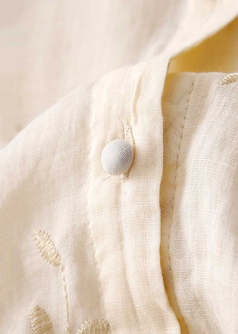 Women's elegant long-sleeve blouse featuring detailed embroidery, perfect for chic spring style.