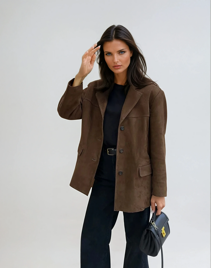 Chic women's everyday blazer jacket in black, perfect for versatile seasonal layering & professional fashion.