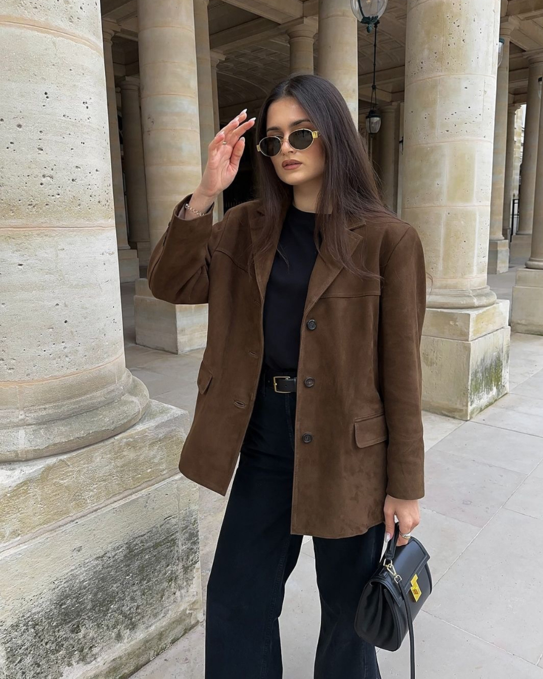 Stylish woman wearing a chic everyday blazer jacket, demonstrating versatile outerwear for elegant women's fashion.