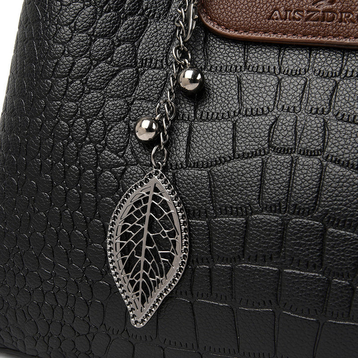 Timeless green women's handbag. Elegant and durable shoulder bag, perfect chic everyday accessory.