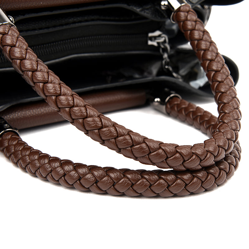 Durable black women's everyday tote. Stylish and chic shoulder bag, a sophisticated fashion accessory.