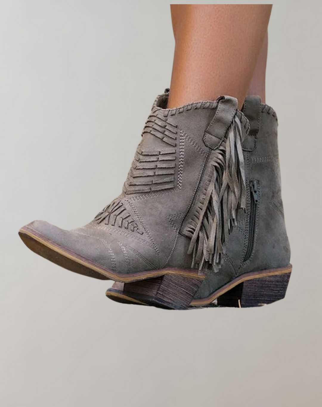 Chic women's fashion ankle boots with tassels, comfortable for fall & winter style.