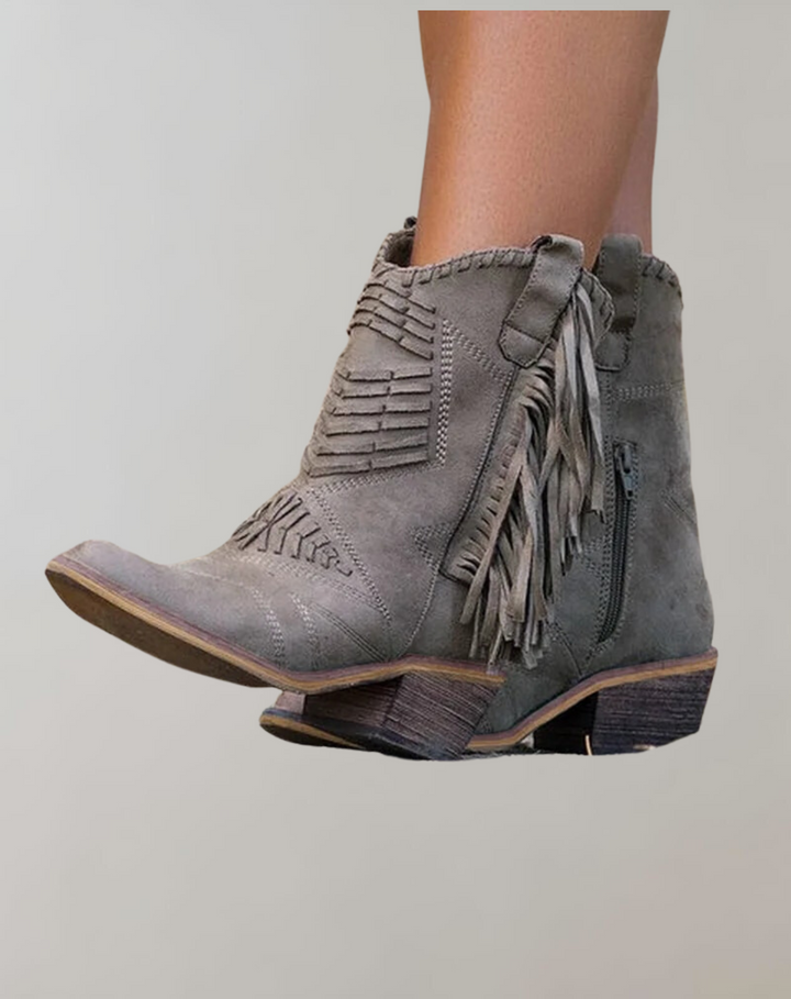 Chic women's fashion ankle boots with tassels, comfortable for fall & winter style.