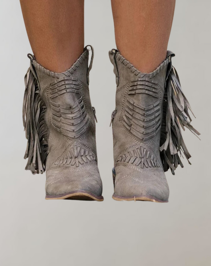 Stylish women's Selena ankle boots featuring elegant tassels, perfect for fall fashion.