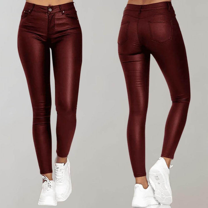 Stylish women's faux leather pants, comfortable high-waisted slim fit. Perfect for chic everyday fashion.