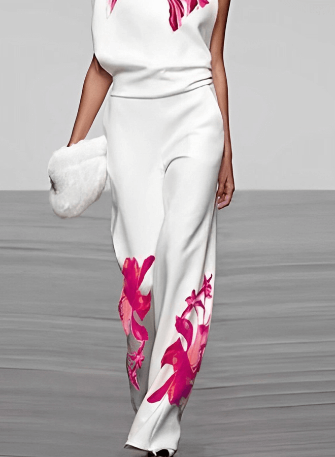 Stylish women's matching floral print turtleneck top and wide-leg pants set. Perfect for versatile spring fashion.