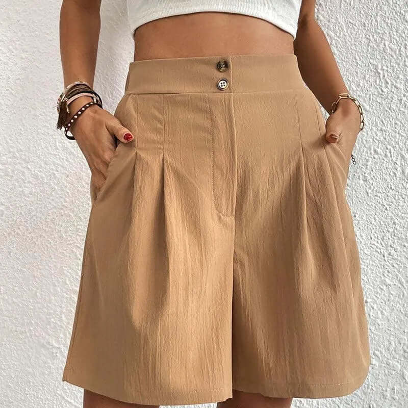 Flattering high-waisted pleated shorts for women. Comfortable & chic, a versatile addition to summer apparel.