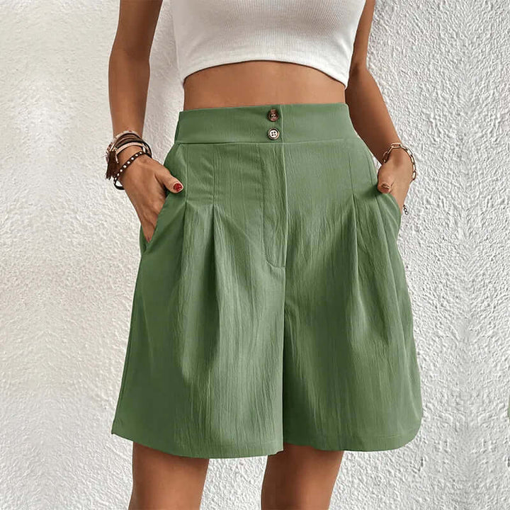Stylish women's high-waisted pleated shorts, offering comfortable wear and a flattering, elegant look for summer.