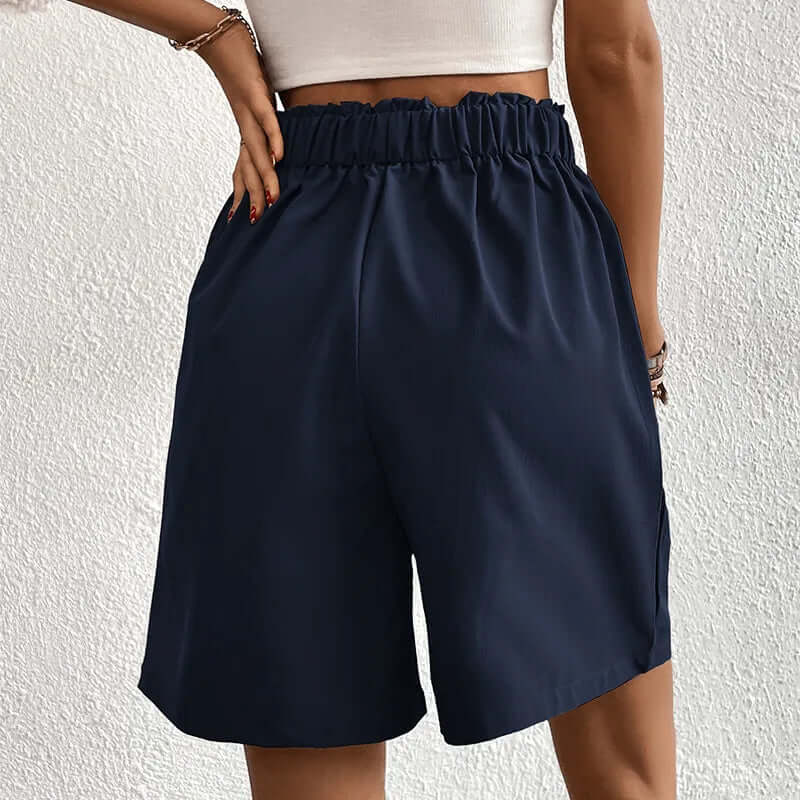 Lightweight, high-waisted pleated shorts for women. Flowy and breathable, excellent for casual summer outfits.