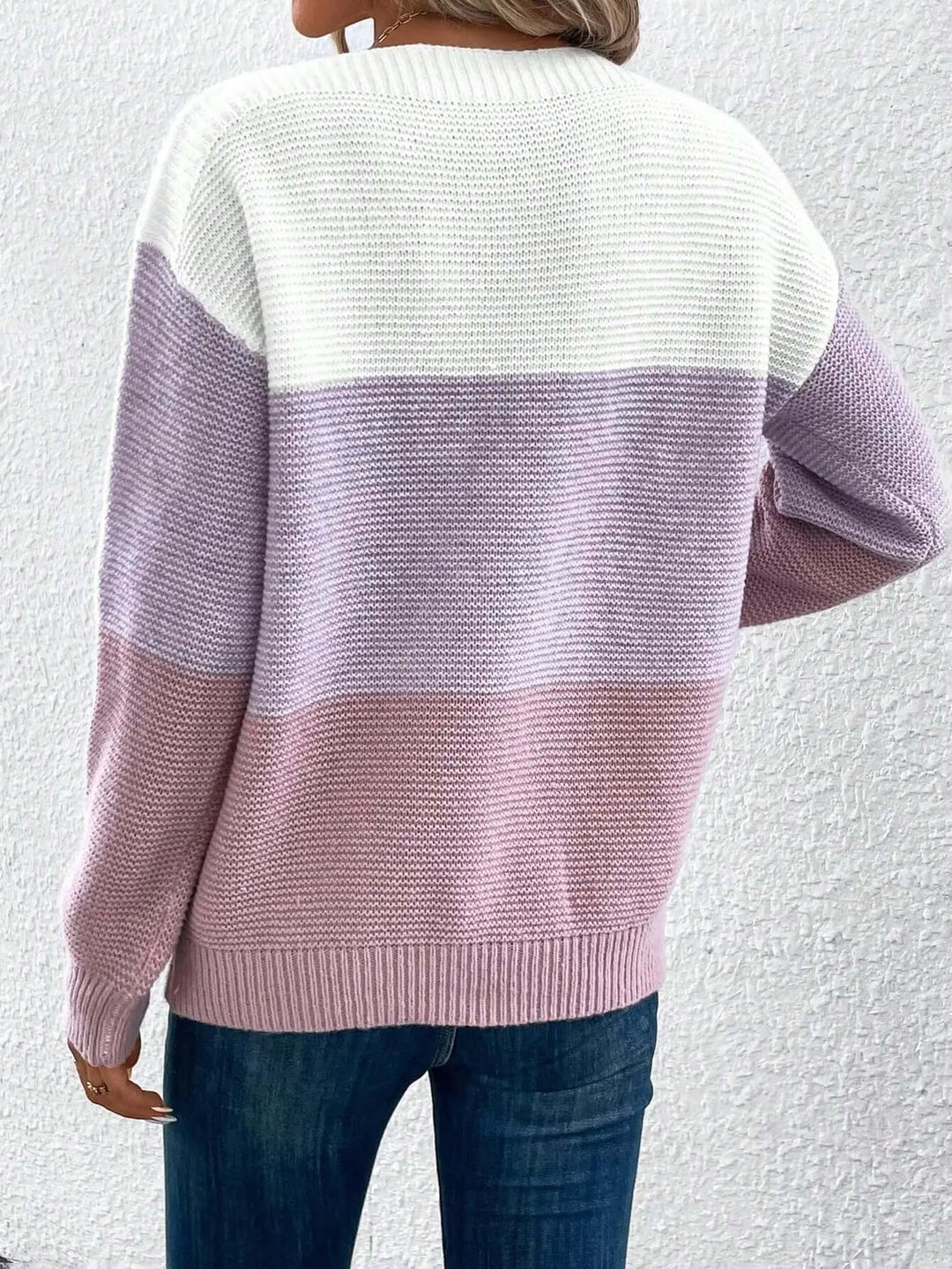 Comfortable women's cozy knit round neck sweater for everyday casual wear.