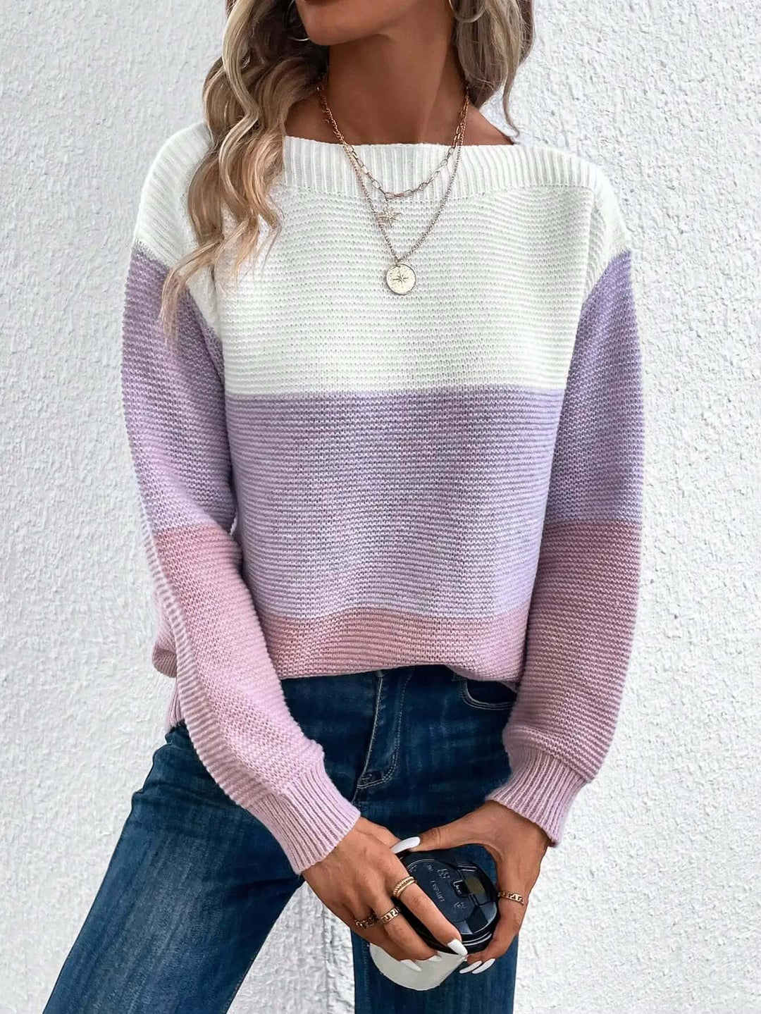 Soft & cozy knit women's round neck sweater with long sleeves, a comfortable pullover.