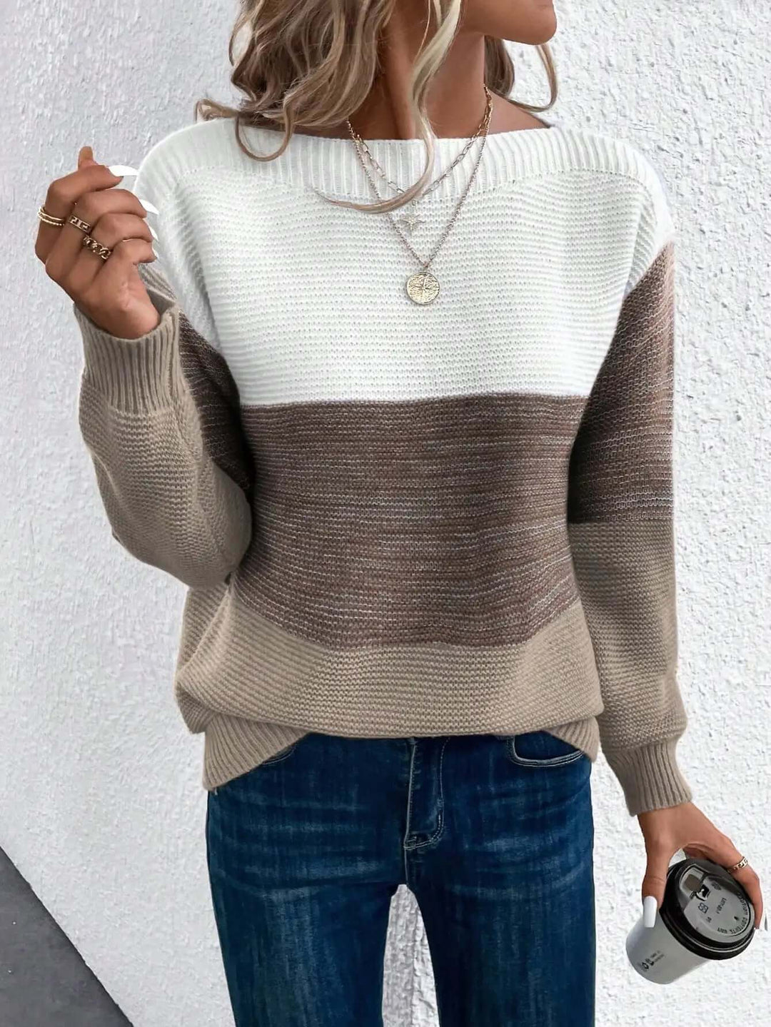 Versatile women's knit pullover, perfect for cozy fall outfits or comfortable winter layering.