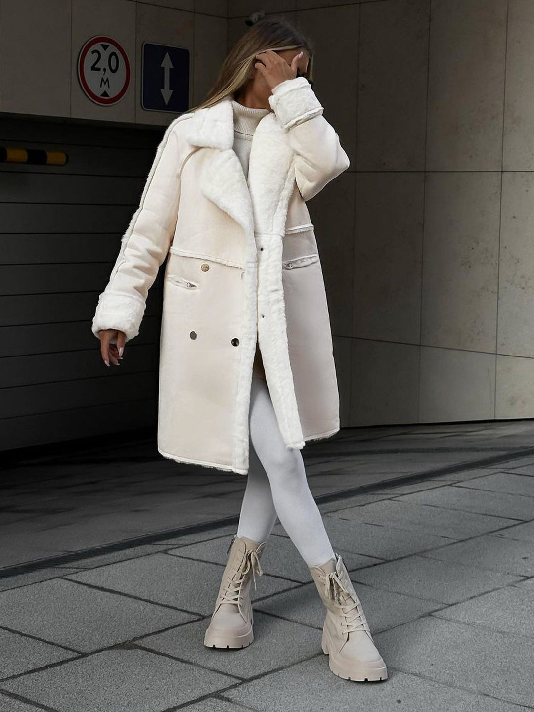 Chic women's long polar fleece winter coat, Ava, for elegant warmth and seasonal style.