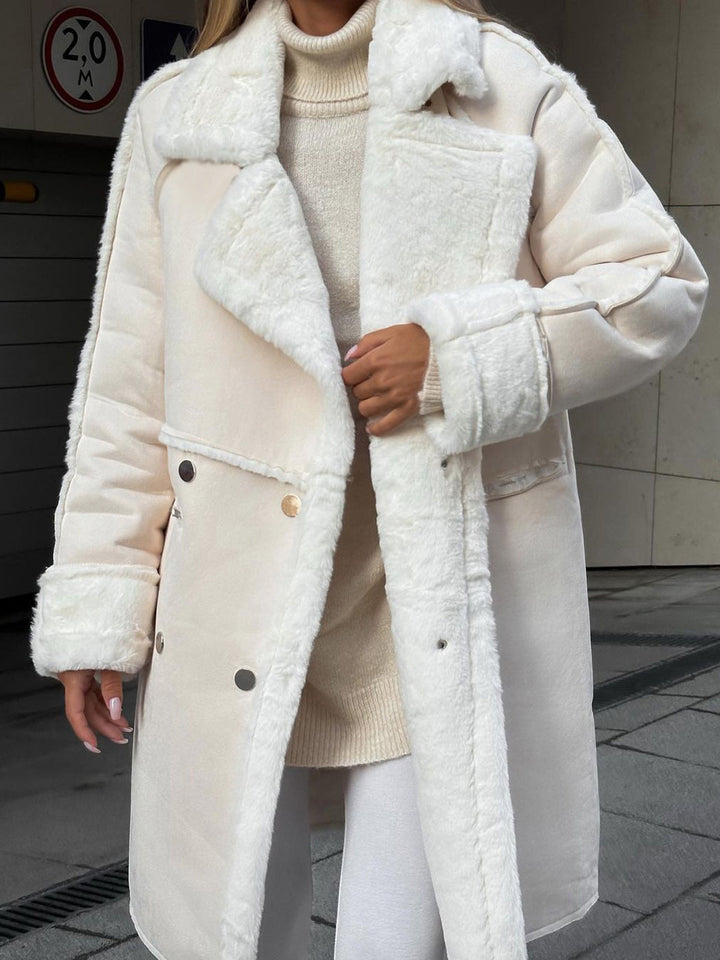 Stylish Ava women's long winter coat, made from warm polar fleece, perfect for comfortable layering.