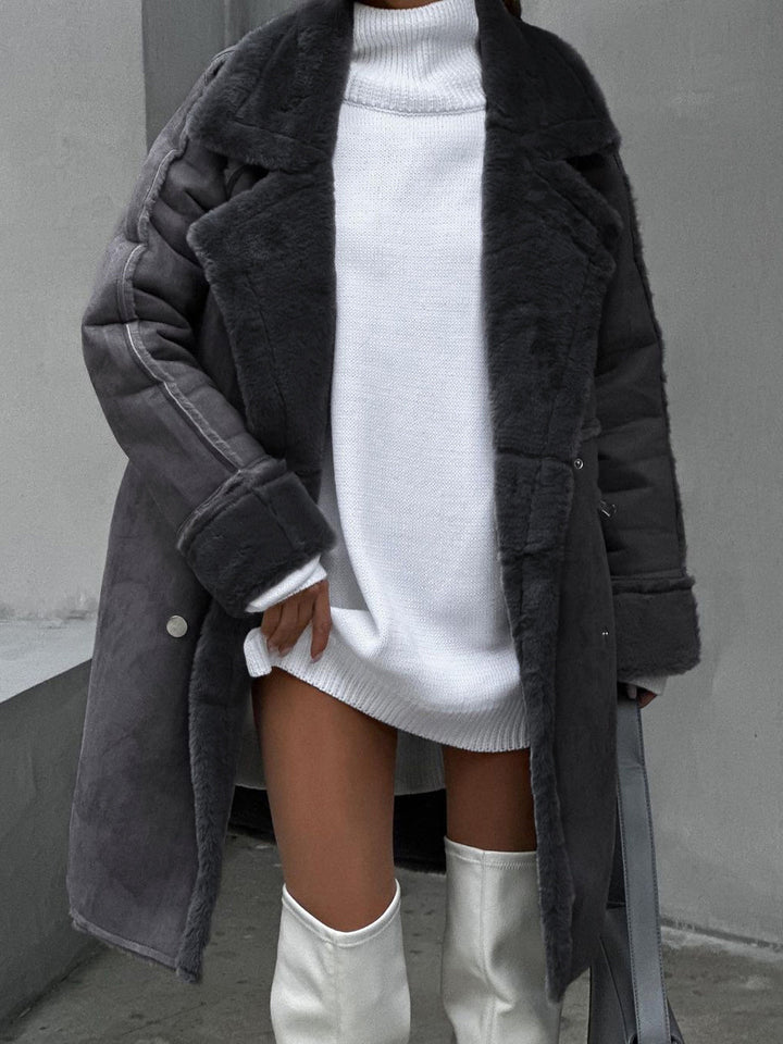Full-length Ava women's long polar fleece winter coat, offering chic style and superior warmth for cold weather.