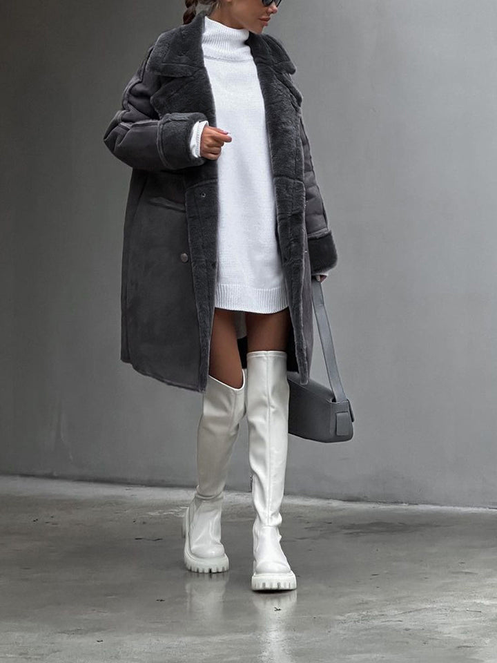 Warm & comfortable Ava women's long winter coat in chic polar fleece, essential elegant outerwear for cold seasons.