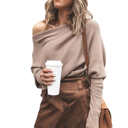 Elegant women's off-shoulder knitted top, a modern long-sleeve jumper for trendy autumn & winter fashion.