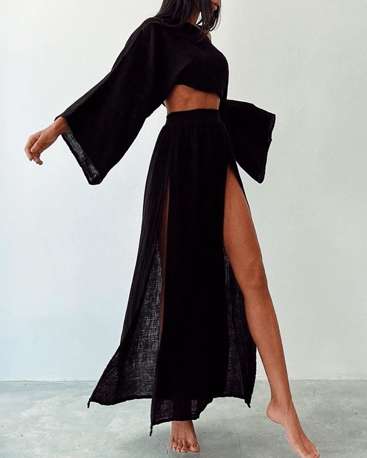 Stylish women's off-shoulder long sleeve top & high-waist maxi skirt set. Chic two-piece summer outfit.