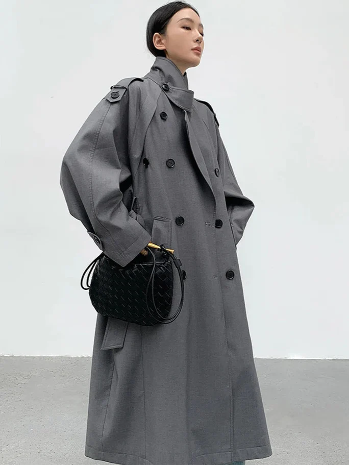 Fashionable women's oversized long trench coat, ideal for winter & fall style.