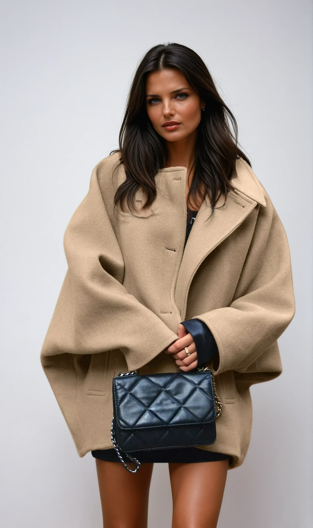 Chic women's oversized winter coat in a relaxed fit, perfect for effortless style & layering in cold weather.