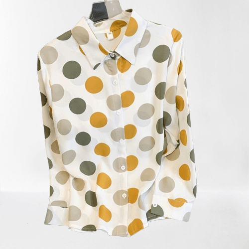 Chic women's polka dot long sleeve button-up shirt. Versatile for casual or office wear, a stylish classic print top.