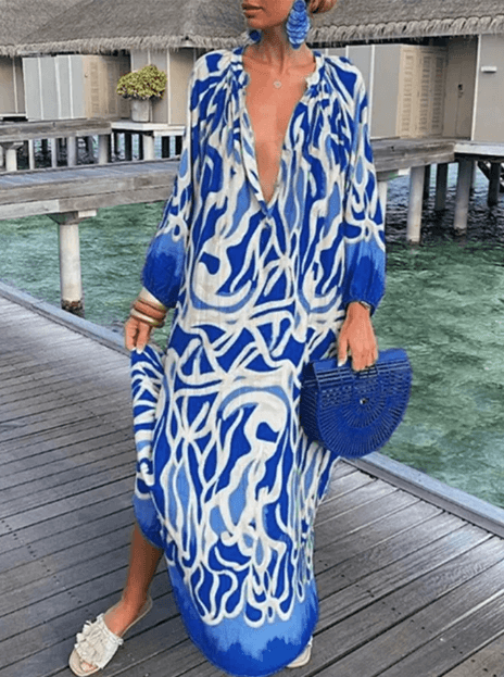 Chic women's printed midi summer dress, perfect for vacation or casual wear. Sleeveless & comfortable.