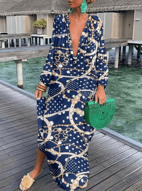 Elegant floral print summer midi dress for women, sleeveless and lightweight, ideal for beach or casual outings.