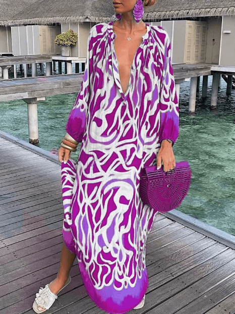 Fashionable women's floral printed summer dress, a chic sleeveless midi, ideal for vacation and effortless style.