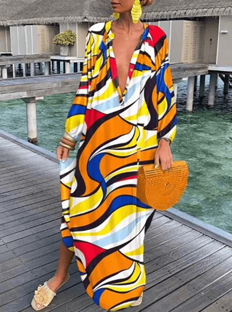 Effortlessly chic women's printed summer midi dress, sleeveless, lightweight, and comfortable for vacation fashion.