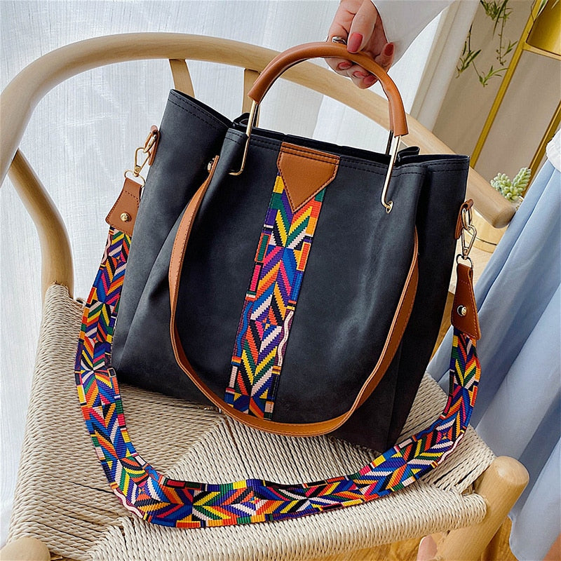 Chic women's PU leather tote bag, perfect for everyday carry. Spacious shoulder handbag for essentials.
