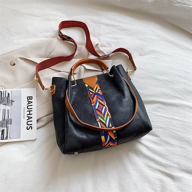 Sophisticated women's PU leather tote bag, perfect for daily carry. Stylish shoulder bag for all occasions.