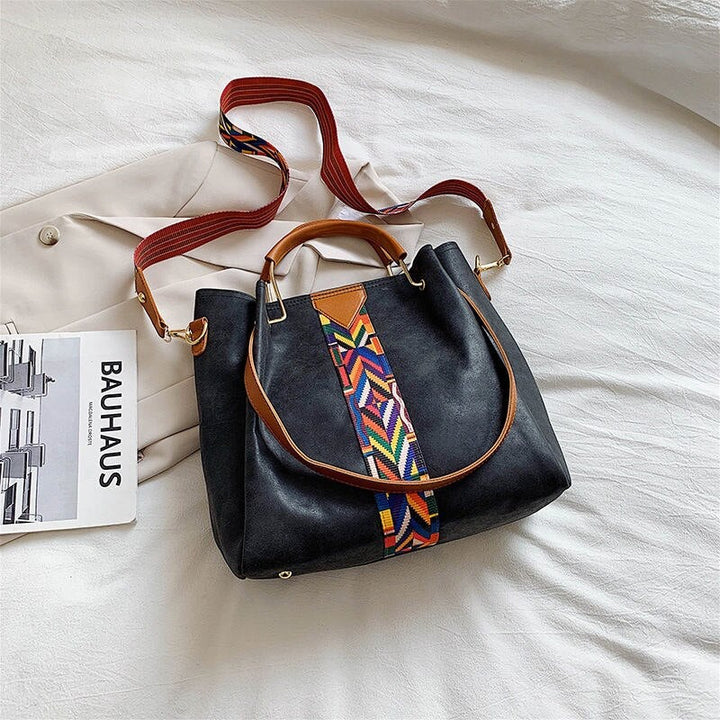 Sophisticated women's PU leather tote bag, perfect for daily carry. Stylish shoulder bag for all occasions.