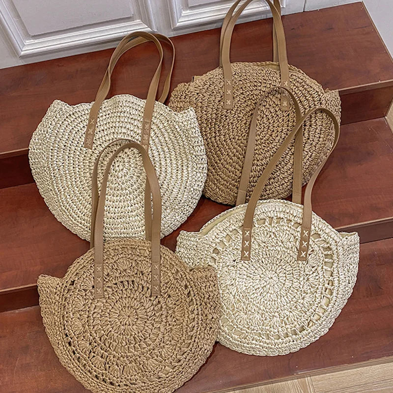 Women's round woven beach bag. Natural boho summer tote, chic shoulder bag for vacation essentials.
