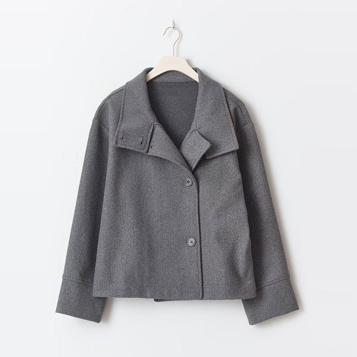 Elegant women's double-breasted short jacket, a modern and stylish outerwear piece for chic fall fashion.